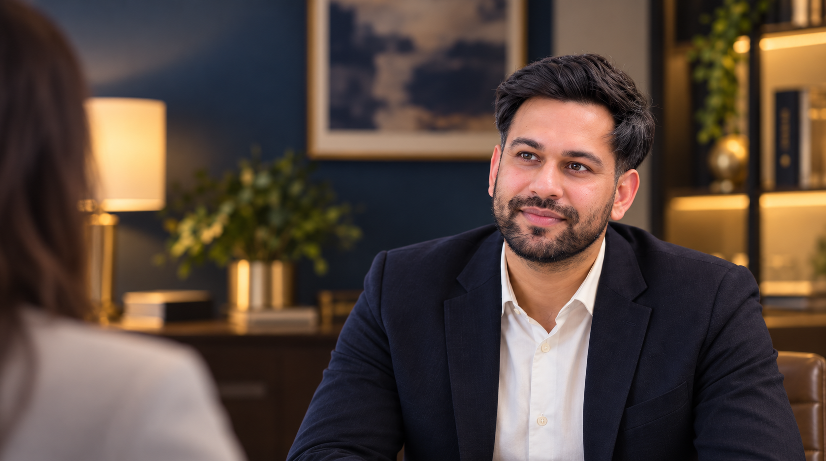A professional workplace consultation in a warm, private office